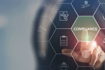 Business professional touching a digital interface highlighting “Compliance” with legal and governance icons.